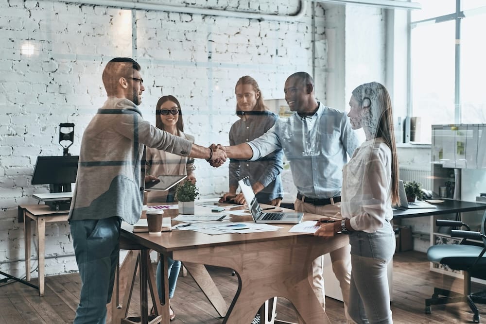 Photo of people working together